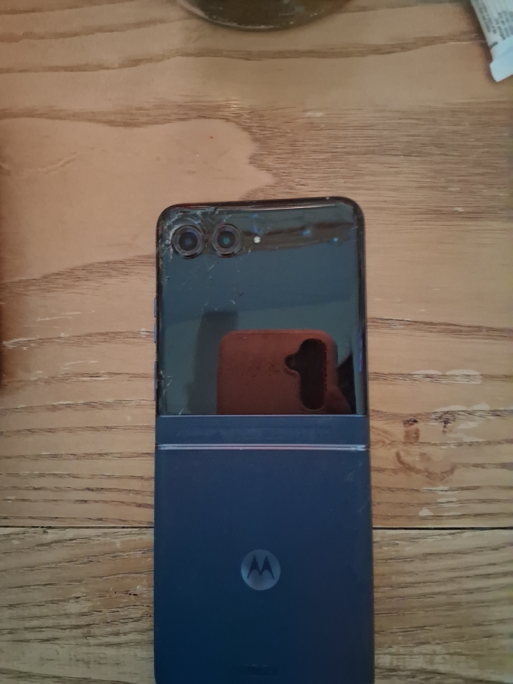 Motorola two-tone foldable phone in black and dark blue
